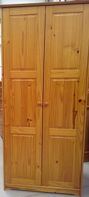 Lot 145 - A Modern Pine Wardrobe. The Wardrobe measures...