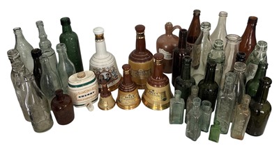 Lot 158 - Vintage glass and ceramic bottles, including...