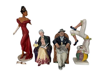 Lot 169 - Four Royal Doulton figures; 'Tumbling' HN 3282,...