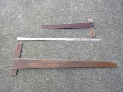 Lot 176 - A Metre Stick and Two Vintage Technical...
