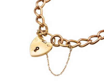 Lot 13 - A 9k yellow gold curb-link bracelet with padlock clasp.