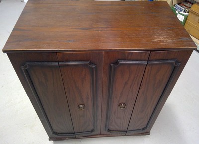 Lot 91 - An Oak Entertainment Centre. 98cm tall, 79cm...