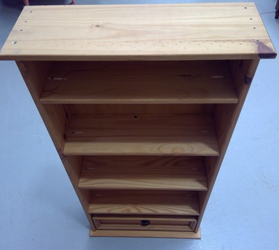 Lot 48 - A Pine Shelf Unit. The height is 100cm, 50cm...