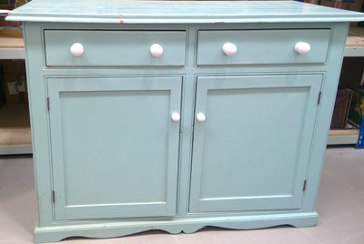 Lot 6 - A Painted Pine Sideboard. The Sideboard is...