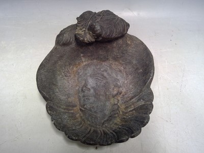 Lot 9 - A Victorian Brass Inkwell. The piece measures...