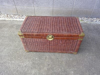 Lot 89 - A Wood and Plastic Trunk. The Trunk is 80cm...