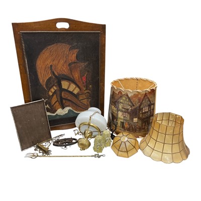 Lot 112 - A painted canvas, Fireguard, Lampshades,...