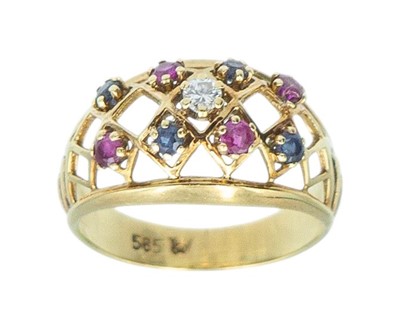 Lot 14 - A 14k gold sapphire, ruby, and diamond openwork dress ring.