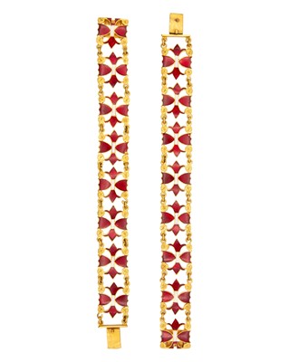 Lot 17 - A pair of high-purity gold with red and white guilloche enamel bracelets.