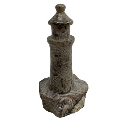 Lot 24 - A Serpentine Lighthouse. 11cm High.
