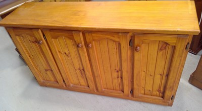 Lot 125 - A Pine Sideboard. The Sideboard is 87cm tall,...