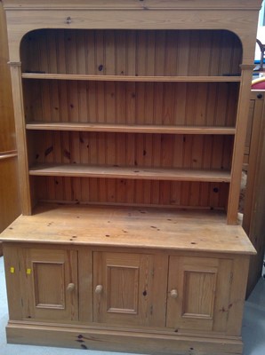 Lot 128 - A Mexican Pine Sideboard Bookcase. The piece...