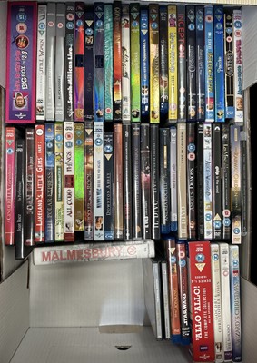 Lot 107 - A box containing DVDs and Blu-ray discs.