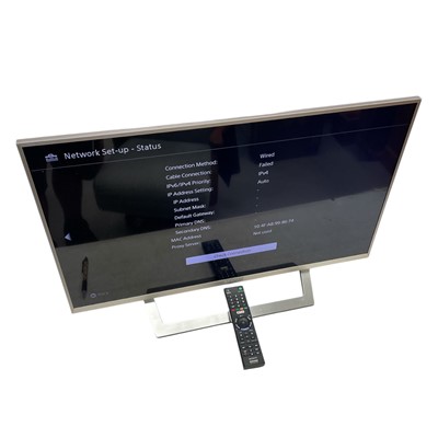 Lot 149 - A Sony 32" Smart TV with a remote and a...
