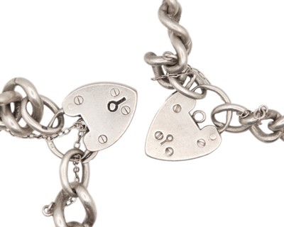 Lot 112 - Two heavy silver hallmarked curb link bracelets.