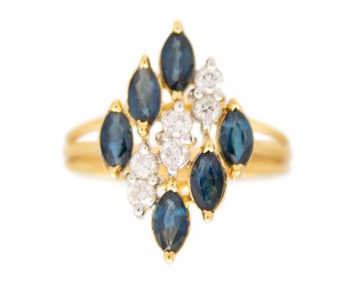 Lot 22 - A 14k gold sapphire and diamond dress ring.