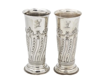 Lot 179 - A pair of Victorian silver embossed vases by F B Thomas & Co.