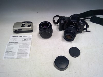 Lot 178 - A Minolta Dynax 303i Camera, a One World Film...