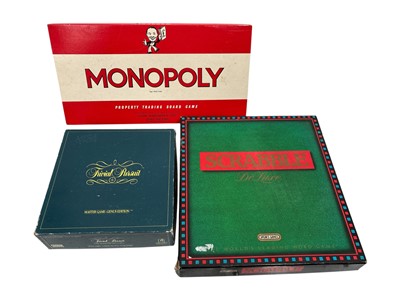Lot 185 - Monopoly, Scrabble Deluxe, and Trivial Pursuit,...