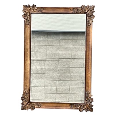 Lot 204 - An Indian Carved Wood framed Mirror. 83 x 120cm.