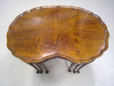 Lot 47 - A Nest of Book-Matched Mahogany Tables.