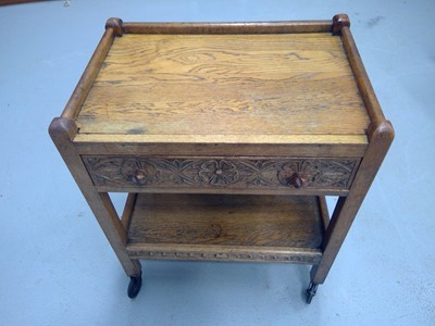 Lot 9 - A 1950s Carved Oak Cutlery / Hostess Trolley....