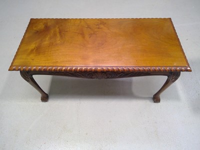 Lot 75 - A Carved Teak Coffee Table. The Table is 42cm...