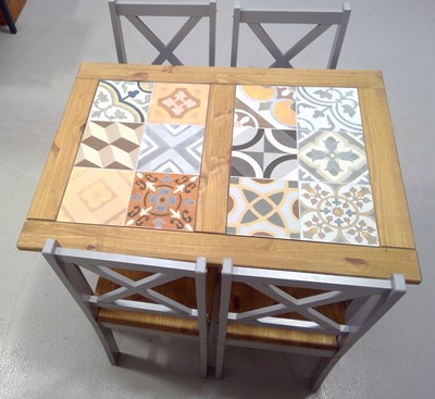Lot 45 - A Tile Effect Breakfast Table and Four Chairs....