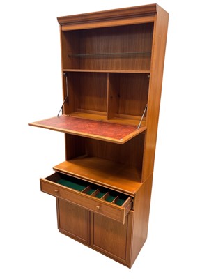 Lot 44 - A Mid-century Drinks Wall Cabinet. The piece...