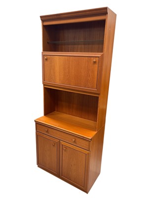 Lot 46 - A Mid-century Drinks Wall Cabinet. The piece...