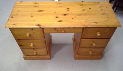 Lot 35 - A Pine Desk. 78cm tall, 136cm wide and 54cm deep.