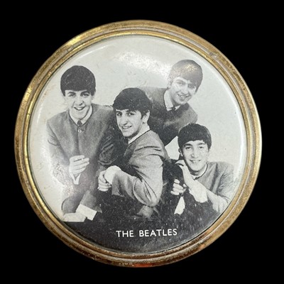 Lot 5 - A rare 1960s The Beatles powder compact in a...