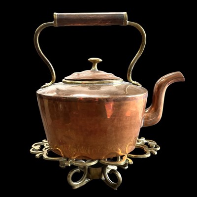 Lot 111 - A brass and copper kettle and brass warming...