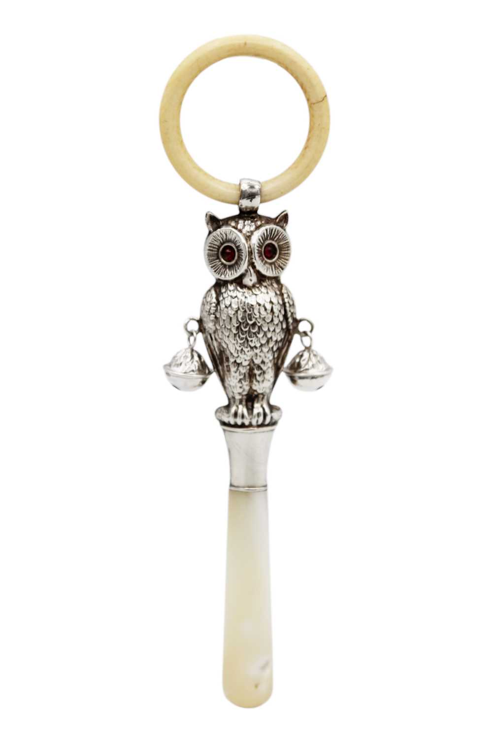 Lot 263 - A good Edwardian silver owl baby's rattle by Crisford & Norris.