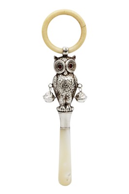 Lot 263 - A good Edwardian silver owl baby's rattle by Crisford & Norris.