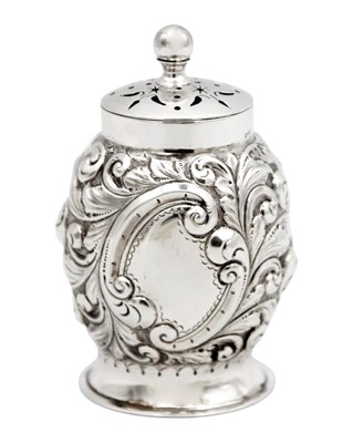 Lot 249 - A Victorian silver leaf scroll embossed ovoid pounce pot.