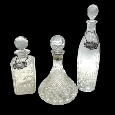 Lot 33 - A hallmarked silver collared decanter,...