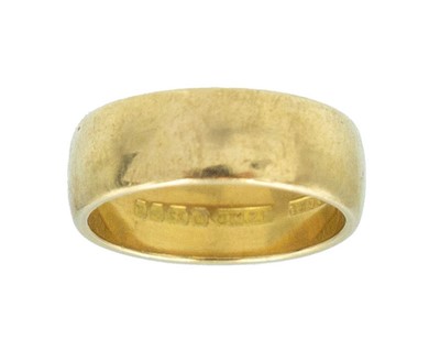 Lot 73 - A 22k hallmarked gold wide band ring.