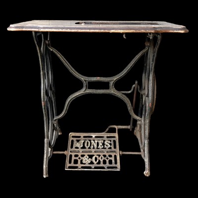 Lot 143 - A vintage Jones & Co sewing machine, cast iron...