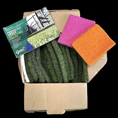 Lot 147 - A box of artificial grass samples, 30 x 30cm,...