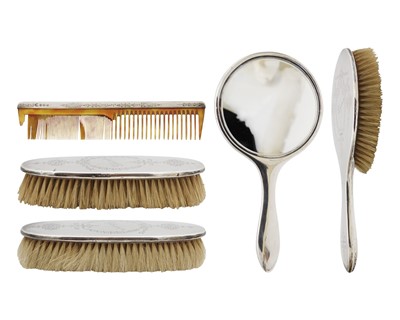 Lot 134 - A George V silver five piece dressing table set by William Aitken.