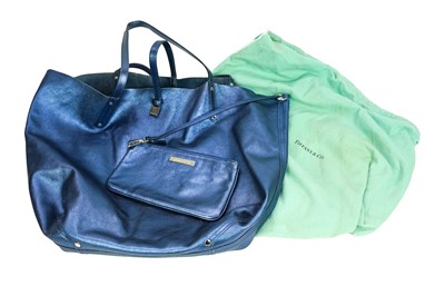 Lot 346 - A Tiffany reversible metallic blue tote bag.