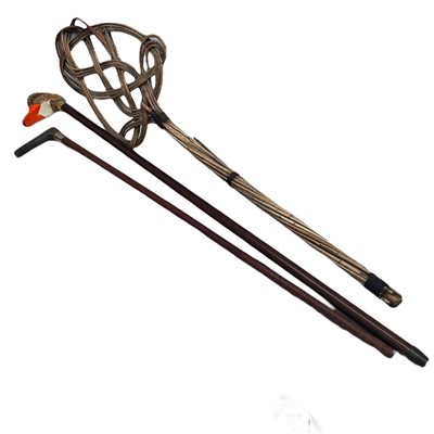Lot 171 - Two Walking sticks, one with a duck's head...