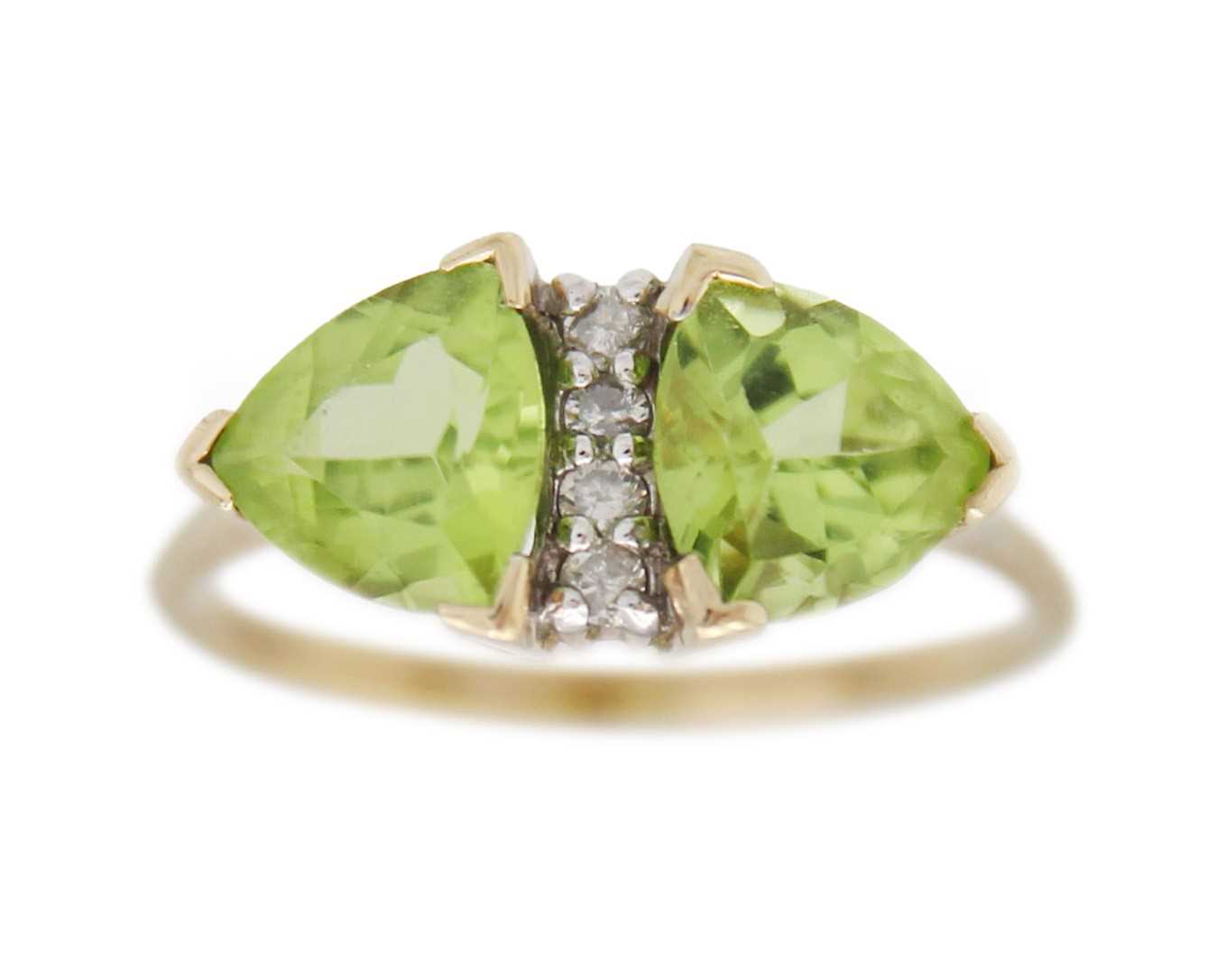 Lot 13 - A 9k gold peridot and diamond ring.