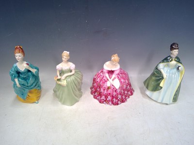 Lot 22 - Four Royal Doulton Figures. The Figures date...