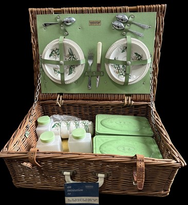 Lot 197 - A vintage Brexton four-place picnic basket.