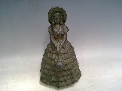 Lot 215 - A Brass Doorstop. The Doorstop is 18cm tall.