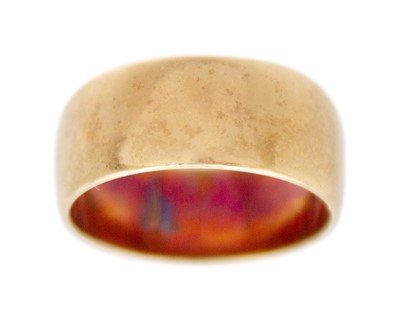 Lot 166 - A 9k gold wide band ring.