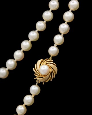 Lot 135 - MIKIMOTO AND Jka KOHLE - an ivory cultured pearl single strand rope length necklace.