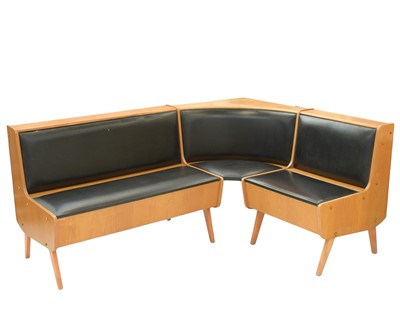 Lot 670 - A 1970s retro beech and vinyl corner seating unit.